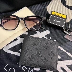 Louis Vuitton Black Embossed Monogram Leather Bifold Wallet